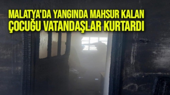 Malatya'da Yangında mahsur kalan çocuğu vatandaşlar kurtardı