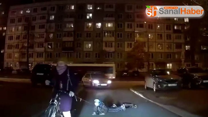Rusya'da çocuğunu bisikletine bağlayan anne tepki çekti